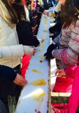 Roll a maple syrup taffy around a popsicle stick